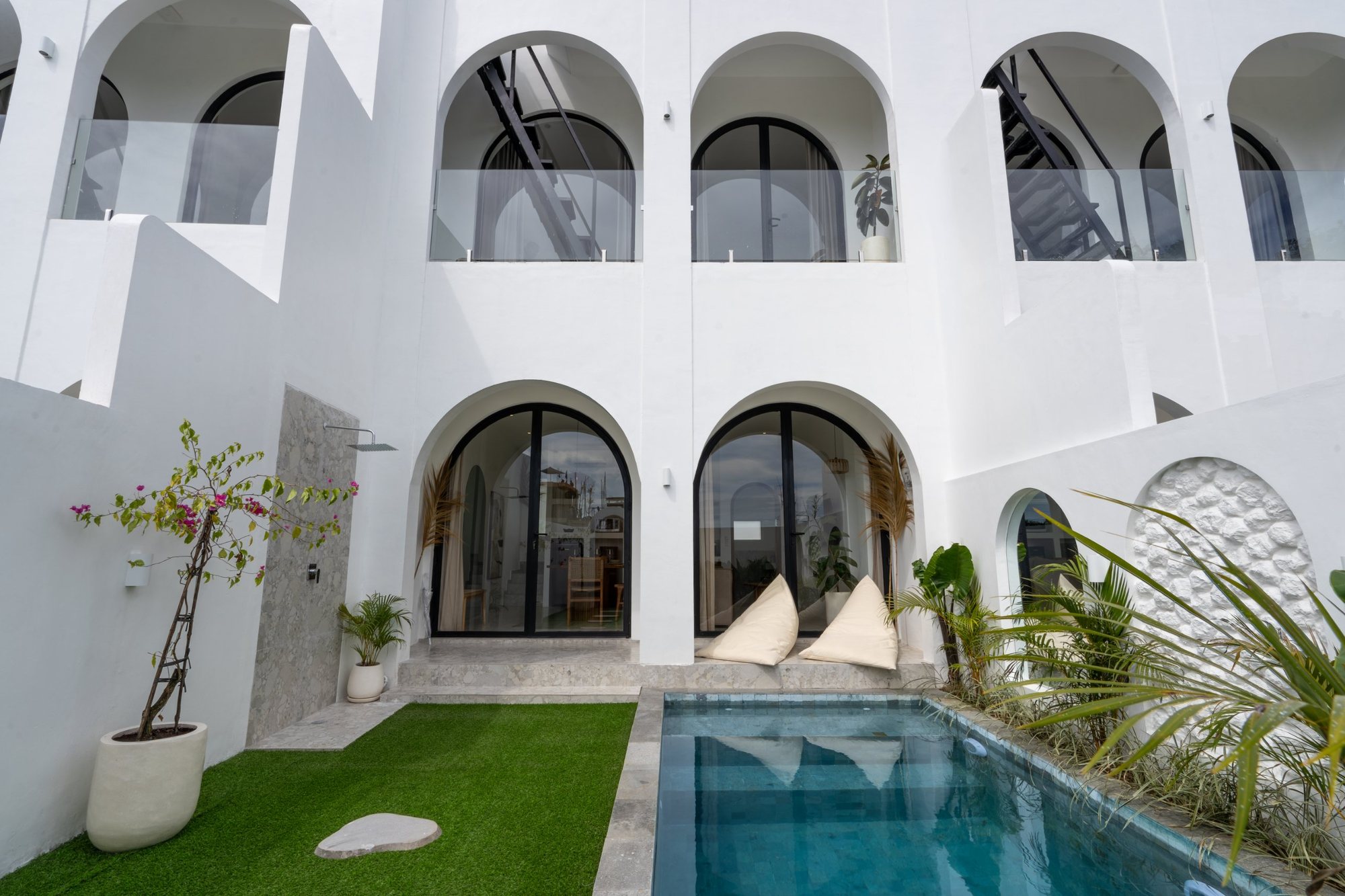 1BR Villa — front with pool and garden