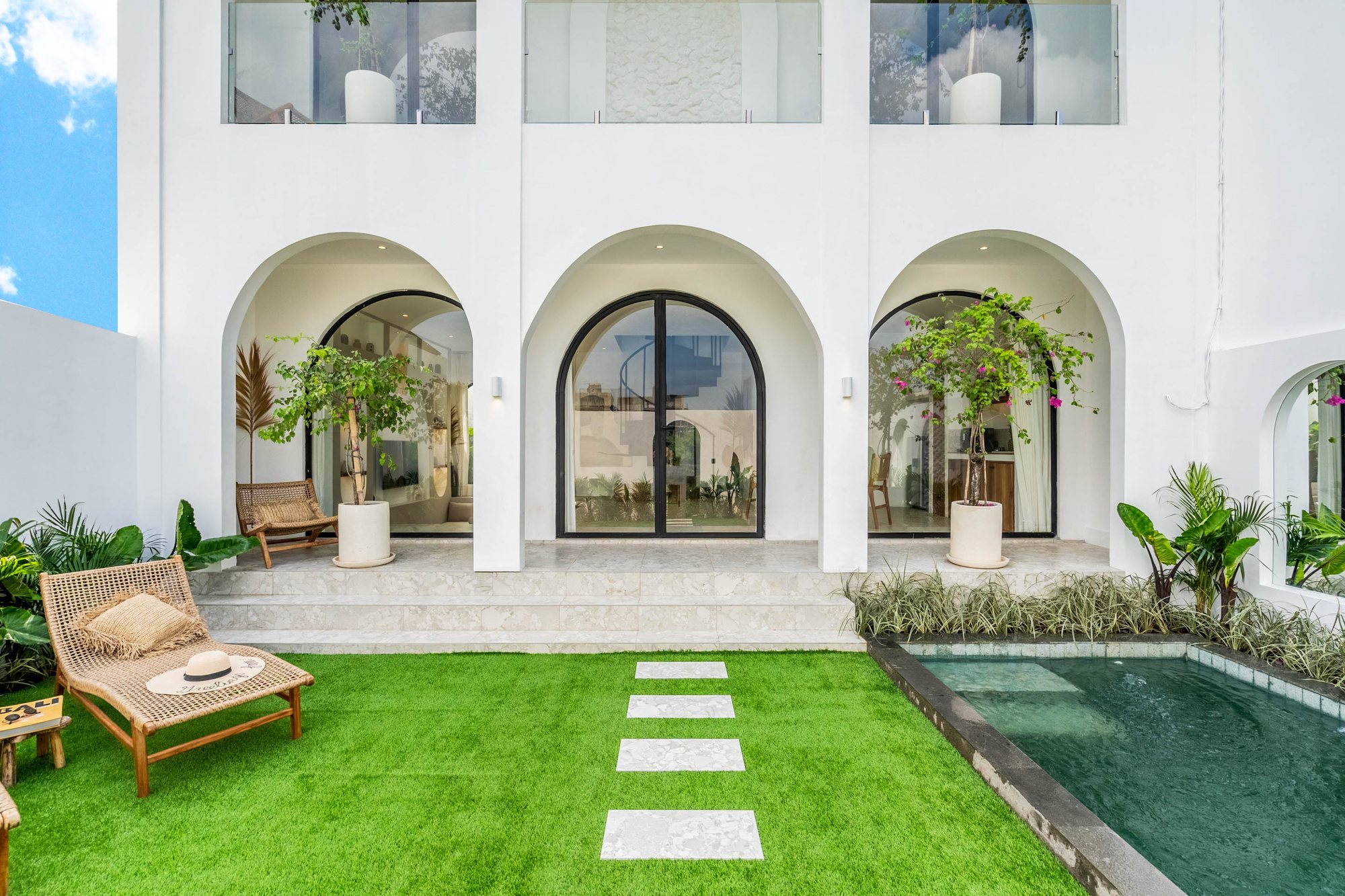 2BR Villa — front with arches and garden